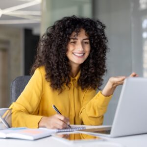 umbrella eap smiling woman at laptop